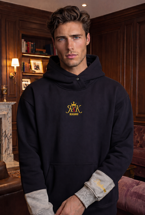 Rajkumarr men's black oversized hoodie front – gold embroidered logo heavyweight pullover
